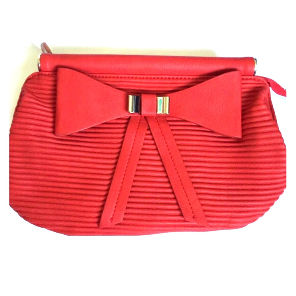 Bow quilted clutch